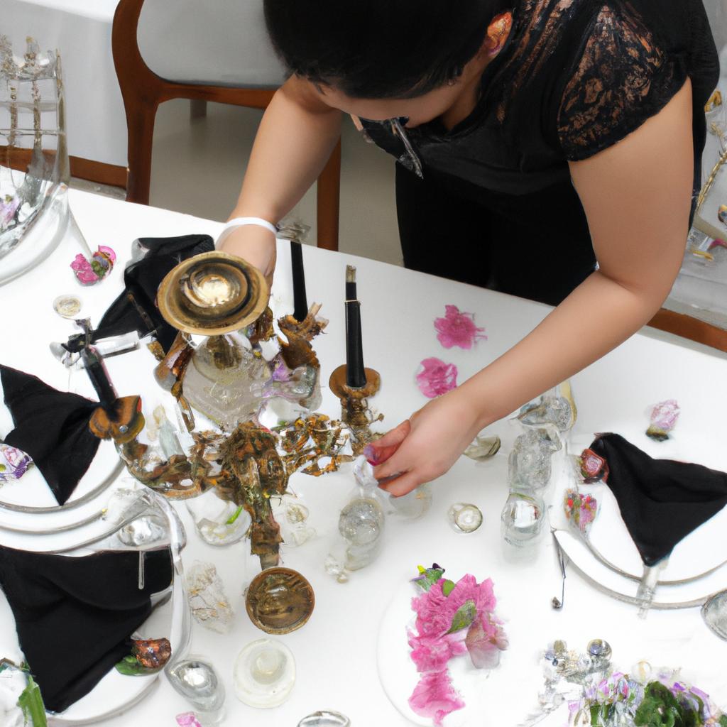 Person arranging banquet table decor